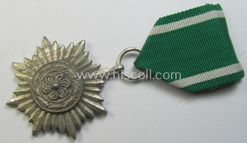 Superb, WH-related: 'Verdienstsauszeichnung für Angehörige der Ostvölker, 2. Kl. in Silber ohne Schwertern' being a maker- (ie. '100'-) marked example that comes stored in its period 'Zellstoff'-based pouch