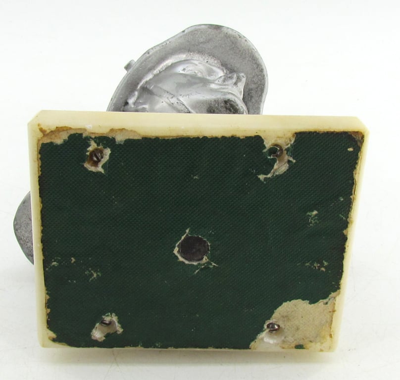 “German Wehrmacht soldier bust desk decoration on marble base.”