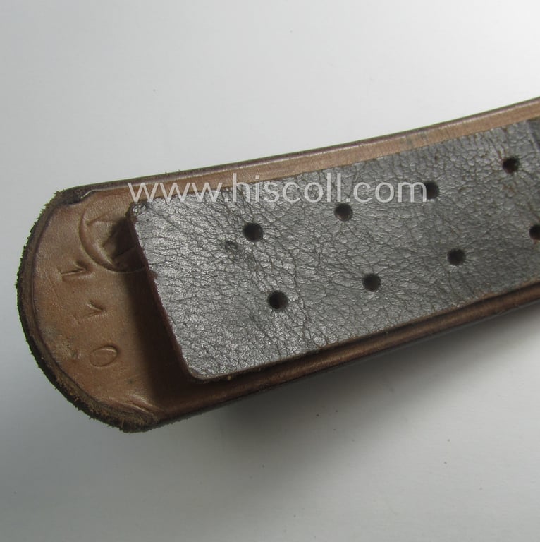 Hardly used, mid- (ie. later-) war-period, black-coloured WH (Heeres, Luftwaffe, Waffen-SS etc.) 'standard-issue'-pattern belt (ie. 'Koppelriemen') being a 110 cms. sized example that shows a (clear) makers'-designation (ie. 'RbN'-numeral)