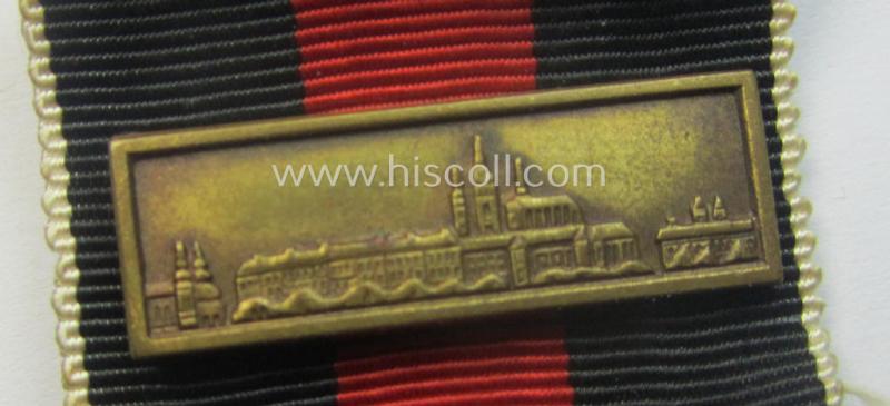 WH Czech-occupation- (ie. 'Anschluss'-) medal: '1. Oktober 1938' that comes mounted onto its period ribbon and that shows a firmly (and period!) attached 'Prager Burg-Spange' and that came with its accompanying 'Feld-/Bandspange'