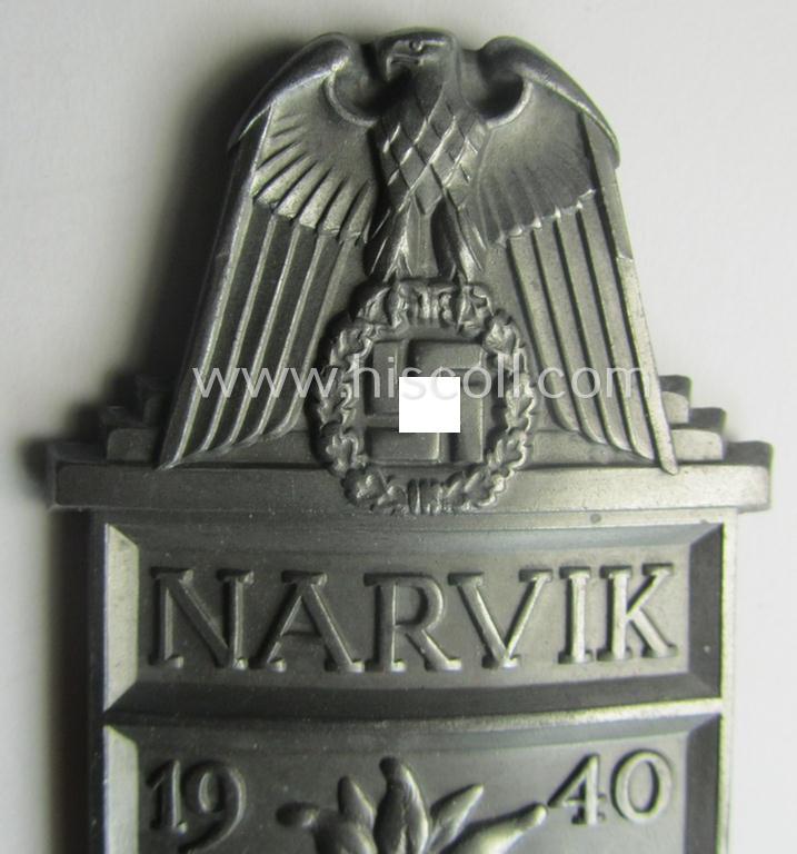 'Virtually mint' - albeit regrettably incomplete - example of a WH (Heeres etc.) 'Narvik'-campaign-shield as executed in typical: 'Feinzink' (as was presumably produced by the: 'Wilhelm Deumer'-company)