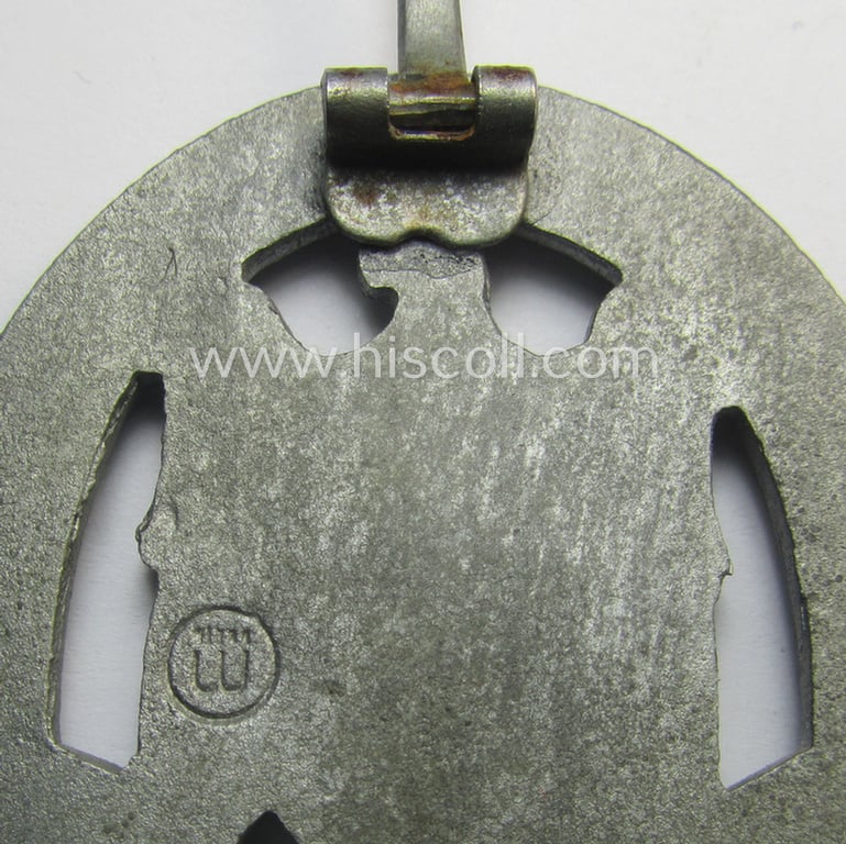 Superb, 'Allgemeines Sturmabzeichen' (or: general assault-badge ie. GAB) being a maker- (ie. 'ÜÜ'- ie. 'E.F. Wiedmann') marked so-called: 'Lily Pad-hinge'-example as was executed in zinc-based metal