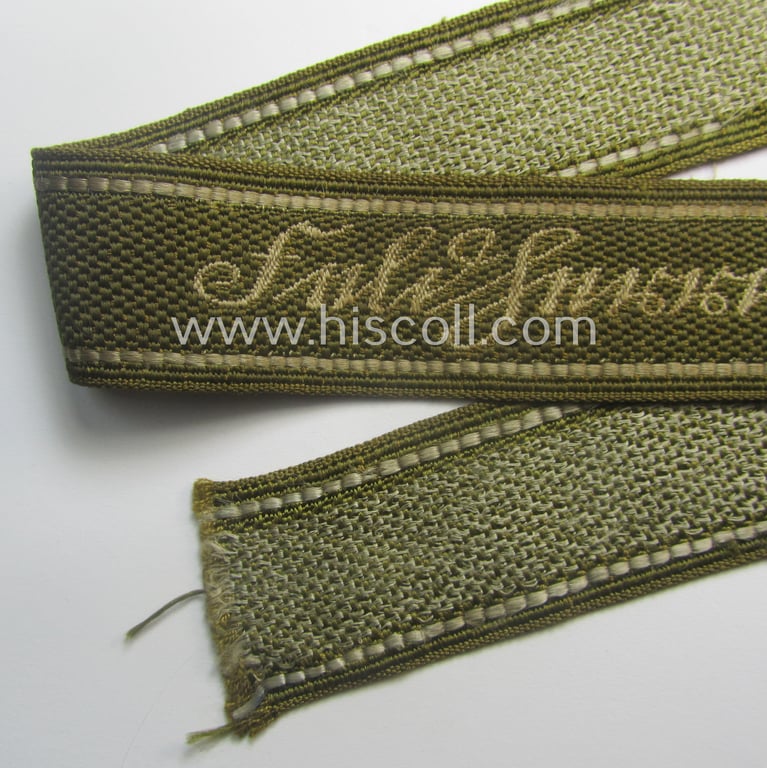 Truly used- and/or tunic-removed - almost full length and scarcely encountered! - WH (Heeres) 'BeVo'-woven: 'FHH-Ärmelstreifen' (ie. cuff-title) as was intended for the soldiers- (ie. NCOs) serving within the: '60. Pz-Gren.-Div. “Feldherrnhalle”