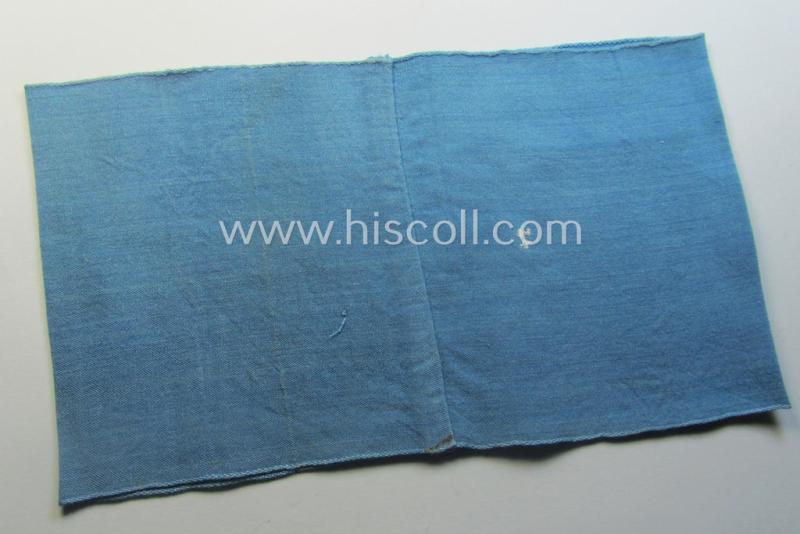 Light-blue-coloured and neatly 'BeVo'-woven, so-called: RLB (or: 'Reichsluftschutzbund') 'Amtsträger'-armband depicting the typical 'RLB'-logo (without lettering) and showing an interwoven makers'-designation (ie. '34'-numeral)