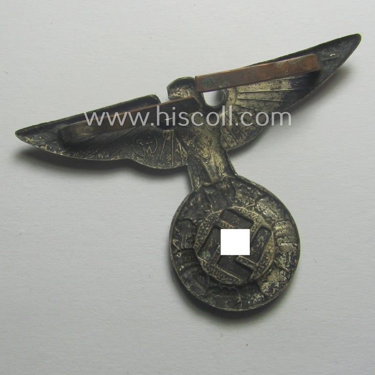 Silver-toned - and I deem 'Buntmetall'-based - early-pattern, SS- o. SA-type, political- ie. 'Art Deco'-styled visor- (ie. 'Schirmmützen'-) cap-eagle being a maker-marked (ie. 'RzM 52'-) marked example