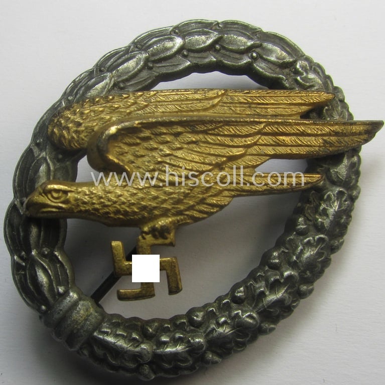 Superb - and somewhat later-war-period - zinc- (ie. 'Feinzink'-) based version of a WH (Luftwaffe) 'Fallschirmschützen-Abzeichen' being a (typical) non-maker-marked example as was produced by the: 'Friedrich Linden'- (ie. 'FLL'-) company