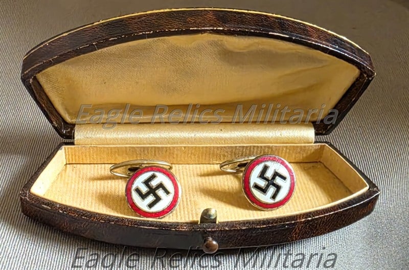 A Pair of Sympathisers Cuff Links in a box