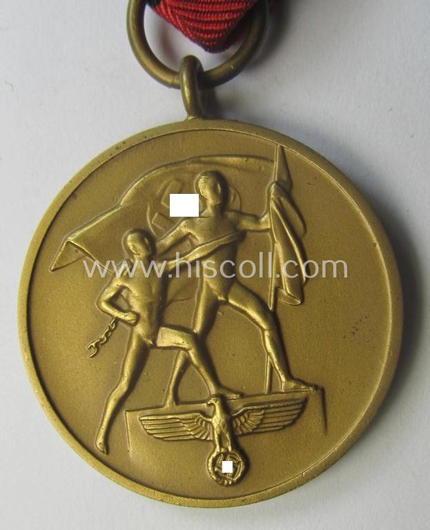 WH Czech-occupation- (ie. 'Anschluss'-) medal: '1. Oktober 1938' that comes with its period-attached 'PB-Spange' and that comes stored in its bordeaux-red-coloured- and/or non-maker-marked etui