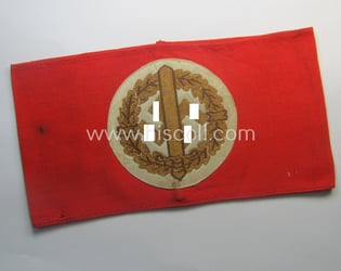 Moderately used and/or worn, linnen-based armband (ie. 'Armbinde')...