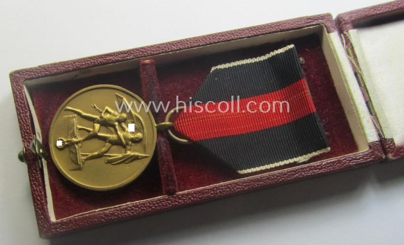 Hardly used, WH Czech-occupation- (ie. 'Anschluss'-) medal: '1. Oktober 1938' that comes stored in its bordeaux-red-coloured- and/or non-maker-marked etui as issued
