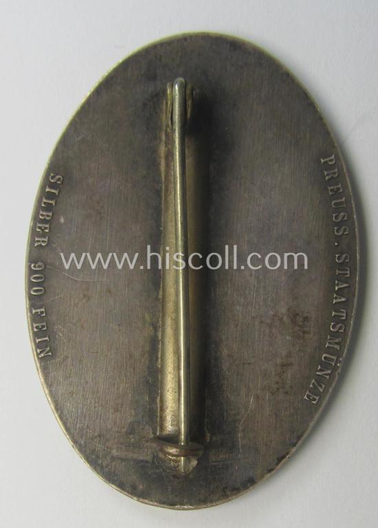 Pre-war-period- and/or genuine silver-based (ie. '900'-stamped), so-called: 'Erinnerungszeichen Verdienste um das Feuerlöschwesen 1934' being a very detailed- and maker- (ie. 'Preuss. Staatsmünze'-) marked, example