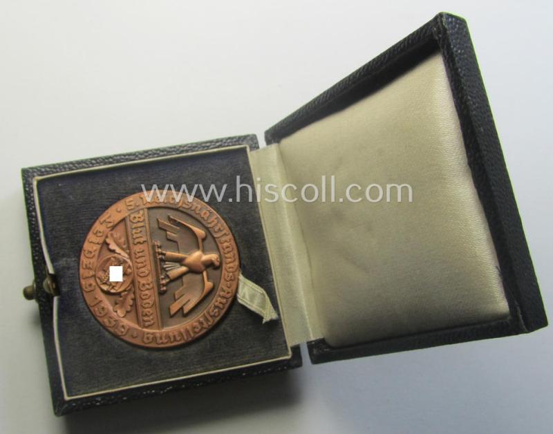 Reddish-bronze-toned, 'Reichsnährstand'- (ie. 'RNSt.'-) related, commemorative-award-plaque entitled: 'Reichsnährstands-Austellung - Blut und Boden - Leipzig 1939 - Lagerbutter' and that comes stored in its period etui
