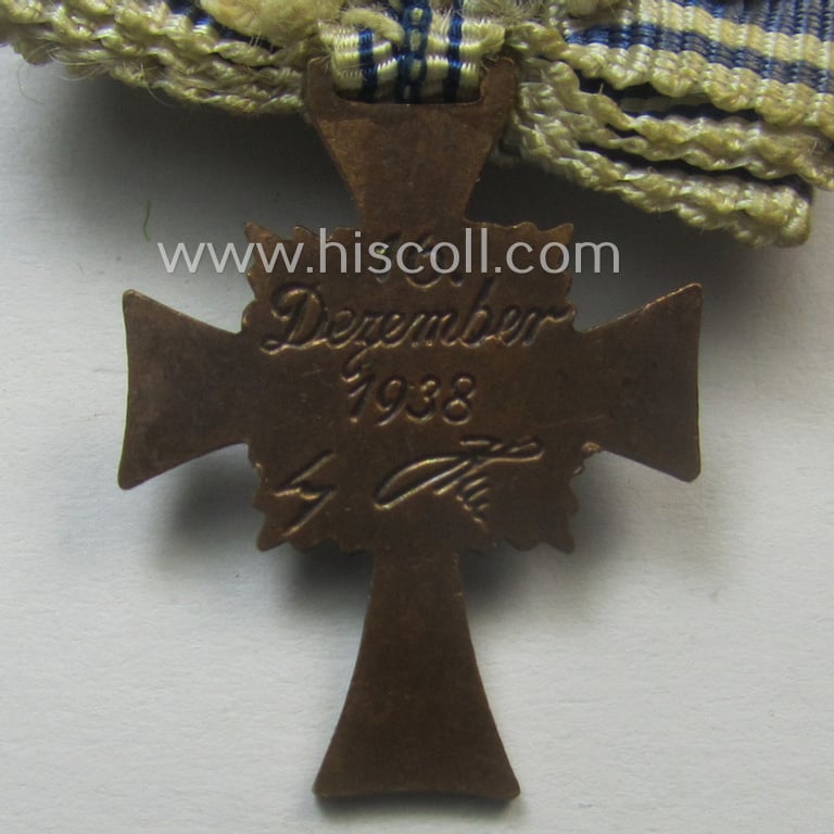 Miniature of an: 'Ehrenkreuz der deutschen Mutter - dritte Stufe' (or: bronze-class mothers'-cross) being a (typical) non-maker-marked example