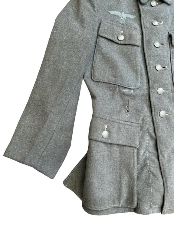 Wehrmacht Heer M43 EM field tunic With Original Applied Insignia