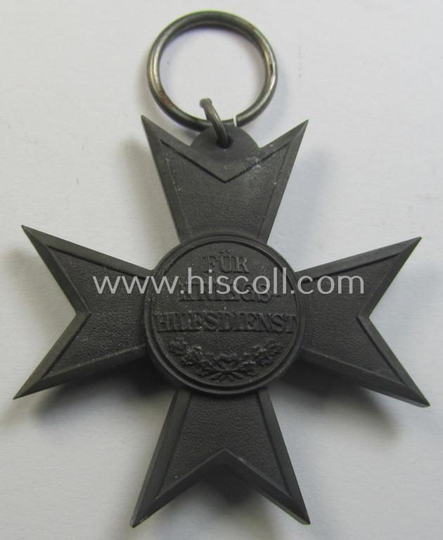 Attractive, WWI-period: 'Verdienstkreuz Kriegshilfsdienst 1916' (or: war service-cross 1916) being a typical, non-maker-marked- and zinc-based example that comes together with its non-confectioned piece of ribbon (ie. 'Bandabschnitt')