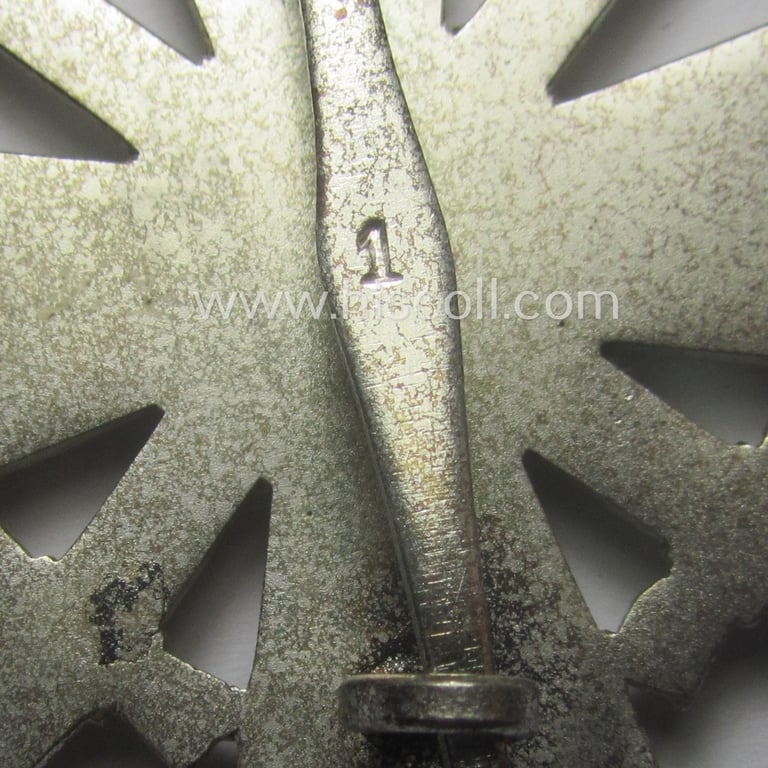 Luxuriously-styled! - 'KvK 1. Klasse mit Schwertern' being an attractive and maker- (ie. '1'-) marked specimen that is executed in typical, silverish-coloured metal (ie. 'Buntmetall') and that comes in a wonderful condition