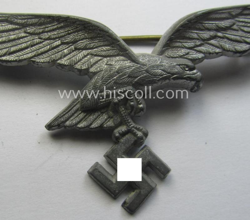 WH (Luftwaffe) zinc- (ie. 'Feinzink'-) based breast-eagle as was specifically intended for usage on the white summer-tunics (ie. 'Brustadler für Sommerrock') being a detailed- albeit non-maker-marked specimen