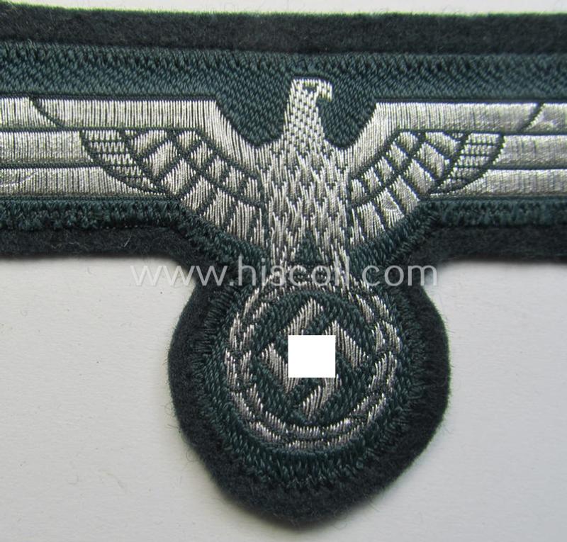 WH (Heeres) breast-eagle as executed in 'BeVo'-type-, so-called: 'flat-wire'-weave-pattern and pre-mounted on darker-green-coloured wool as was specifically intended for usage by soldiers (ie. NCOs) on their dress-tunics (ie. 'Waffenröcke')
