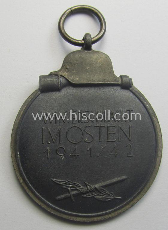 Fully matching medal-set: 'Winterschlacht im Osten 1941/42' as produced by the: 'Hauptmünzamt - Wien'-company being a clearly maker- (ie. '30'-marked) specimen that came stored in its original 'Zellstoff'-based pouch of issue as found
