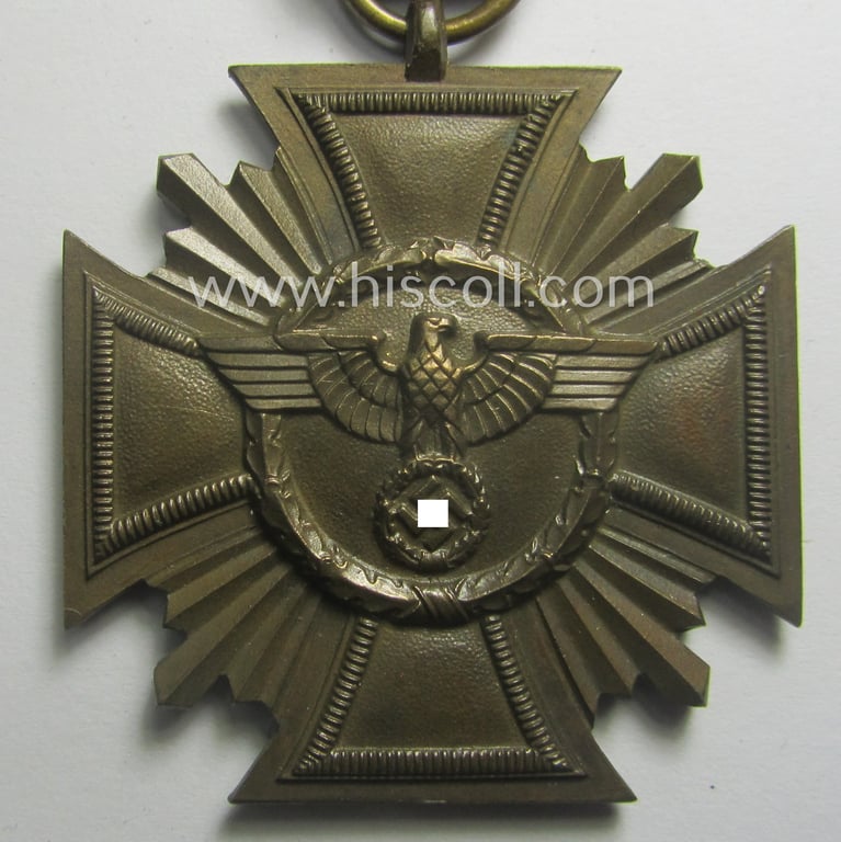 'N.S.D.A.P. Dienstauszeichnung in Bronze' (ie. '3. Stufe für 10 Jahre t. Dienste') being a non-maker- marked- (and typical 'Buntmetall'-based!) example that came mounted onto its period ribbon