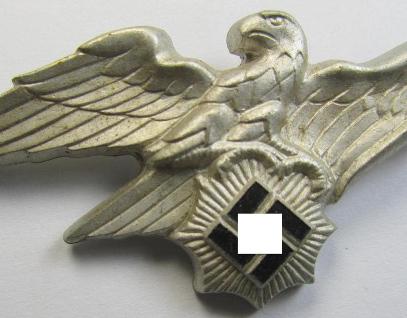 Attractive - and scarcely encountered! - officers'- (ie. evt. NCO-) pattern, aluminium-based so-called: 'Luftschutz' (ie. RLB-) visor-cap eagle being a maker- (ie. 'HA'-) marked example as was produced by the 'H. Aurich'-company