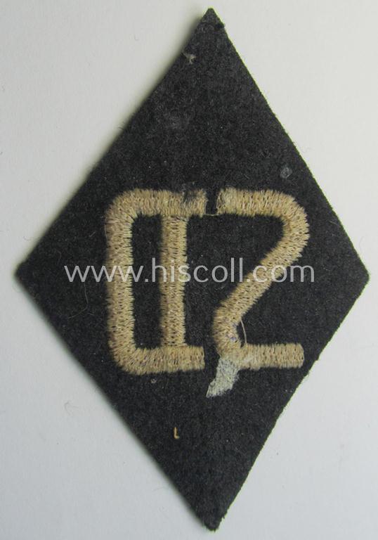 Superb, 'SS/SD'-related sleeve-diamond (ie.: 'Ärmelraute für Mannschaften u. Unteroffiziere im SD o. Sicherheitsdienst') being a very detailed- and machine-embroidered example that has lost its period-attached 'RzM'-etiket