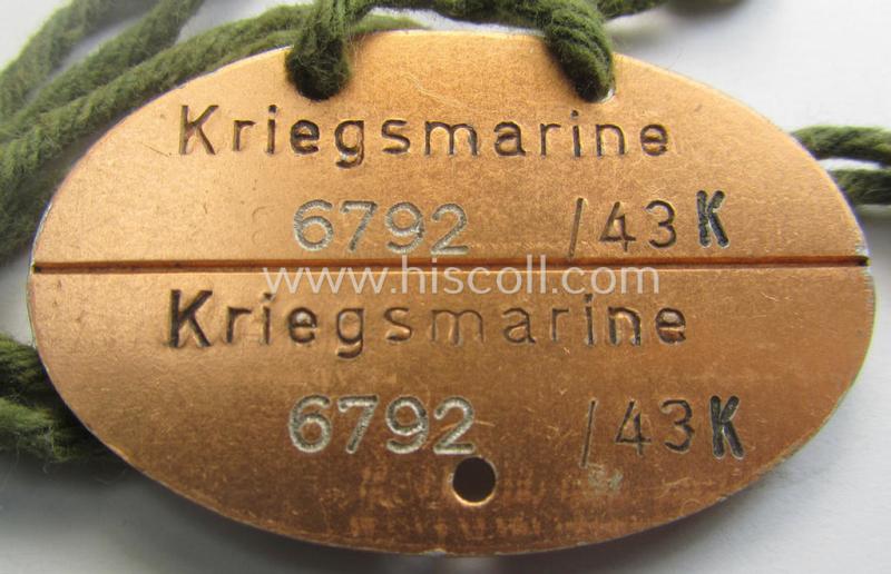Mid-war- (albeit 'standard-issue'-) pattern, WH (Kriegsmarine) typical aluminium-based- and/or bright golden-bronze toned ID-disc (ie. 'Erkennungsmarke') bearing the engraved coded numeral (ie. text) that simply reads: 'Kriegsmarine 6792/43K'