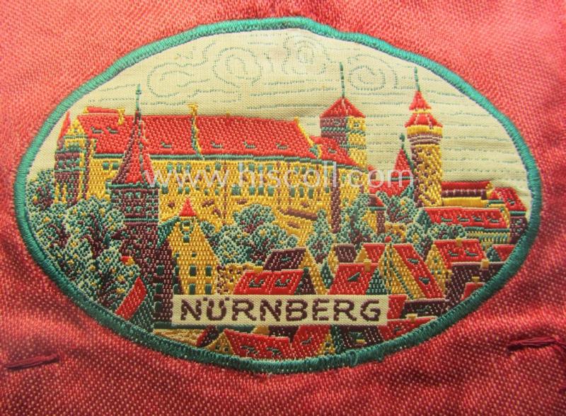 'Patriotic-styled', N.S.D.A.P.-related vehicle- ie. bicycle-flag (ie. 'Fahrrad-Fahne') depicting on one side an interwoven illustration of three men holding a statue of a 'Reichsadler'-device coupled with the text: 'Reichsparteitag 1937'