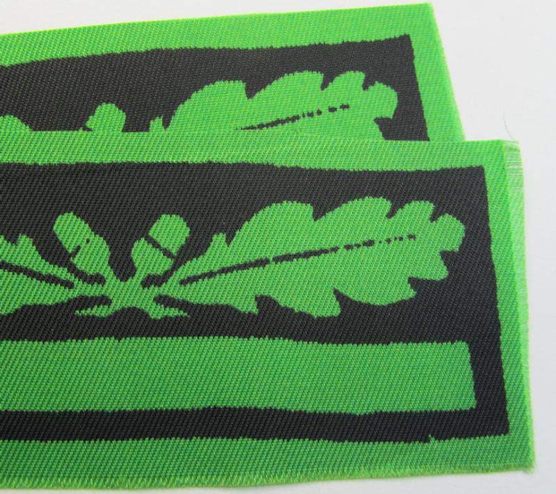 Attractive - and fully matching! - pair of officers'-pattern, WH (Heeres o. Waffen-SS) rank-insignia-bars (for usage on the various camouflaged-uniforms) as was used by an officer holding the rank of: 'Leutnant' (ie.: 'SS Untersturmführer')