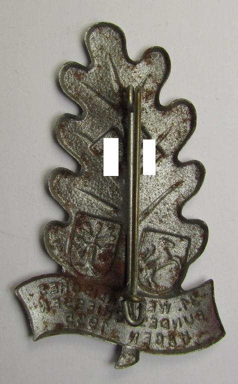 Commemorative, silver-toned- (and/or tin-based) shooting-contest (ie. N.S.D.A.P.-related) day-badge depicting a so-called: 'Eichenlaubblatt', swastika and text: '31. Westfälisches Bundesschiessen - Hagen - 1935'