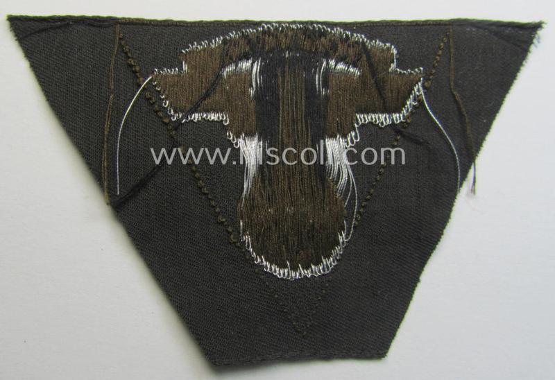 Attractive - and 'virtually mint'! - so-called: N.S.K.K. (ie. 'National Socialistisches Kraftfahr Korps') side-cap-eagle (ie. 'Adler für Schiffchenmütze') being a 'flat-wire-woven'-example that comes mounted onto a darker-brown-coloured backg...