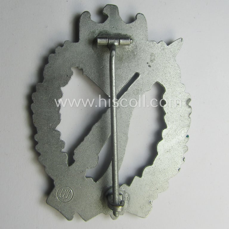 Superb, 'Infanterie Sturmabzeichen in Silber' (or: silver-class infantry assault-badge ie. IAB) being a maker- (ie. 'ÜÜ'- ie. 'E.F. Wiedmann') marked so-called: 'Lily Pad-hinge'-example as was executed in zinc-based metal