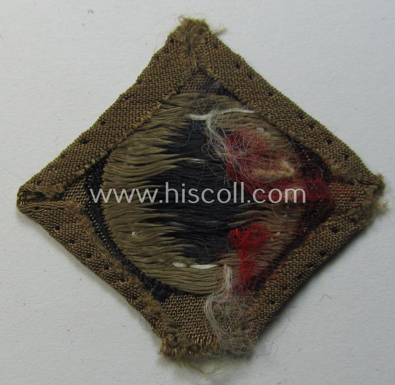 Superb - and very rarely encountered! - replacement-piece: a WH (Heeres) 'tropical-issued' cocarde (of the first pattern!) as was used on the tropical side- (and/or 'M41'-type) caps as executed in neat 'BeVo'-weave pattern