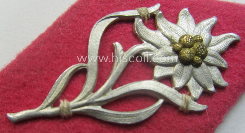 SA- (ie. 'Sturmabteilungen'-) related, aluminium-based cap- (ie. 'Kepi'-) device that came mounted onto its bright-pink-toned, 'Raute'-shaped 'backing' (that still shows its period-attached 'RzM'-etiket)