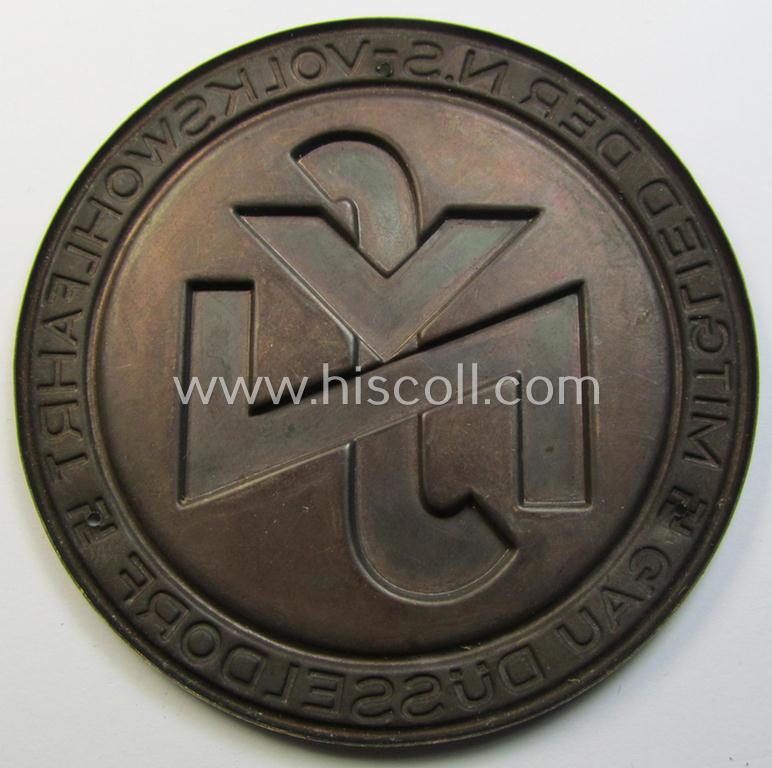 Attractive - and very detailed! - neatly reddish-bronze-coloured (and I deem copper-toned- ie. 'tin-metal'-based-) so-called: 'door-plaque' (ie. 'Türplakette') entitled: 'Mitglied der N.S.-Volkswohlfahrt' (N.S.V.) - Gau Düsseldorf'