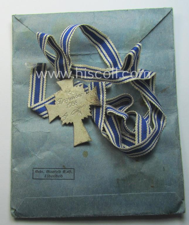 'Ehrenkreuz der deutschen Mutter - zweite Stufe' (or: silver-class mothers'-cross) that came mounted onto its long-sized ribbon and that came stored in its period pouch by the (unusual!) maker: 'Gebr. Gloerfeld K.G. - Lüdenscheid'