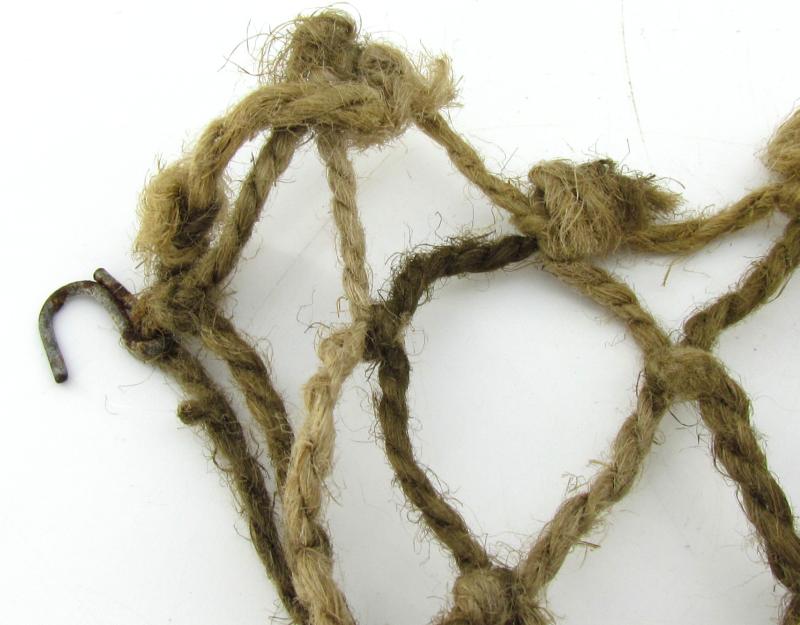 Complete late war German helmet net with attachment hooks