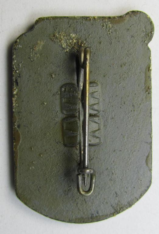 Dutch NSB-party-related, so-called: 'Hagespraak'-lapel-pin (ie. 'Veranstaltungsabzeichen' ie. tinnie) that is executed in golden-bronze-toned, aluminium-based metal and depicting the text: 'Goudsberg - Vrijheid en Recht - 1940'