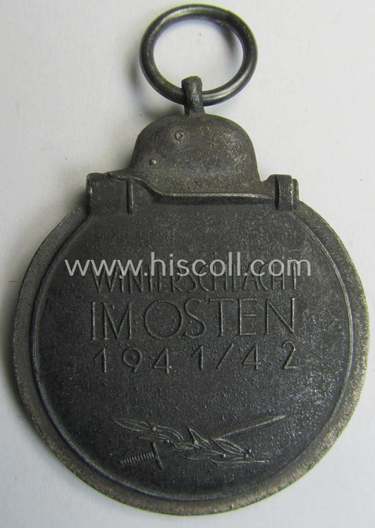 Attractive medal-set: 'Winterschlacht im Osten 1941-42' being a maker- (ie. '14'-) marked- (and/or 'Feinzink'-based) specimen by the maker: 'L.Chr. Lauer' and that comes together with its (minimally confectioned) ribbon (ie. 'Bandabschnitt'...
