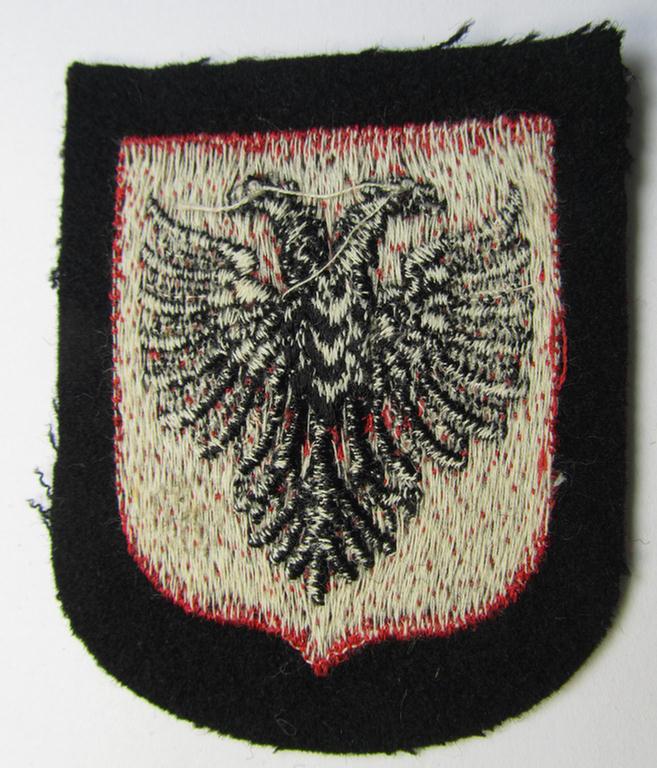 Waffen-SS 'volunteer'-arm-shield as was intended for usage by soldiers of the: '21. Waffen-Grenadier-Division der SS' “Skanderbeg” (ie. 'albanische Nr. 1') and that comes in a 'virtually mint- ie. unissued', condition