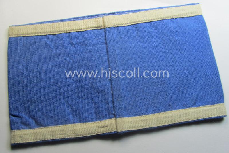 Unusually seen, linnen-based- and/or light-blue-coloured, DAF- (ie. KDF-) related armband (ie. 'Armbinde') showing white-linnen-toned borders and depicting the typical 'KDF'-logo and text: 'Stadtführer - N.S.G. Kraft durch Freude'