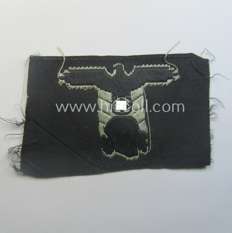 Waffen-SS black-coloured M43-pattern 'Panzer'-cap-trapezoid as executed in 'BeVo'-weave-pattern as was specifically intended for usage on the M43-model field-caps (ie. 'Einheitsfeldmützen')