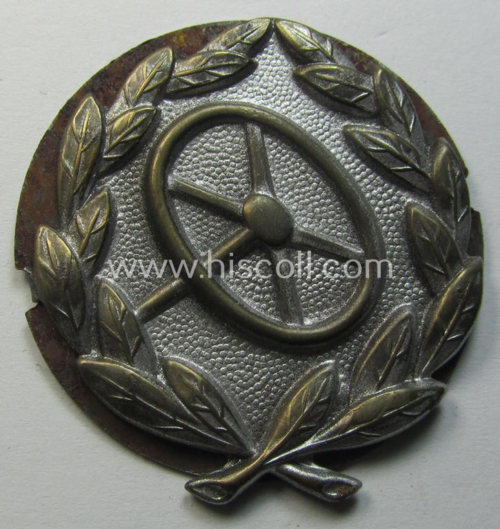 Attractive, WH (Heeres-, LW- ie. Waffen-SS-) so-called: 'Kraftfahrbewährungs-Abzeichen in Silber' being a 'virtually mint' example as was produced by the: 'Rudolf Souval'-company and that came stored in its  'Zellstoff'-based pouch