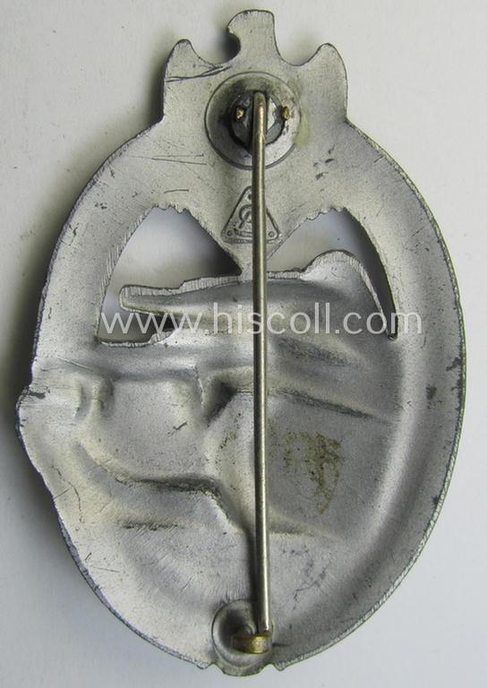 'Panzerkampfabzeichen in Silber' (or: silver-class panzer-assault badge or PAB) being a clearly maker- (ie. 'AS' in a triangle-) marked- and/or typical zinc- (ie. 'Feinzink'-) based specimen as was procuced by a to date unknown maker