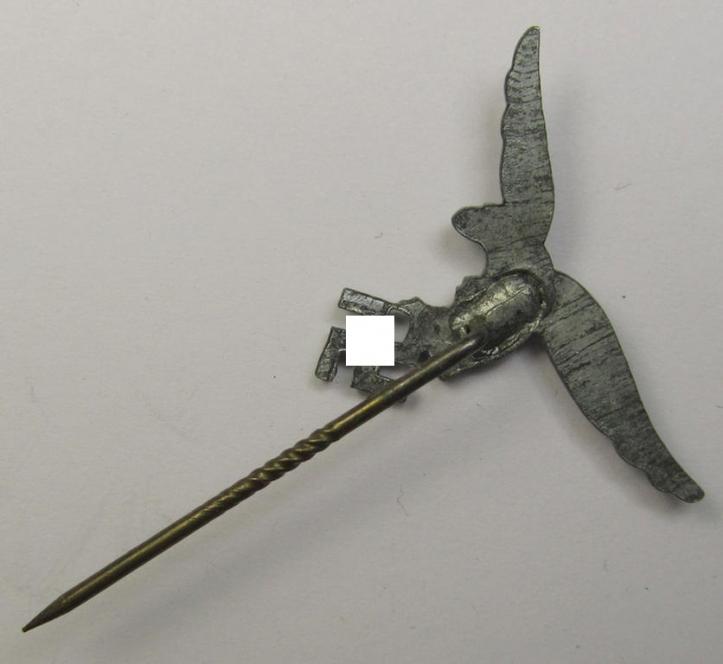 Greyish-silver-toned lapel-pin (ie. 'Zivilabzeichen') to be worn on the civil attire as was intended for usage by the various staff-members of the 'Luftwaffe' (depicting an early-pattern- ie. 'down-tailed'-eagle)