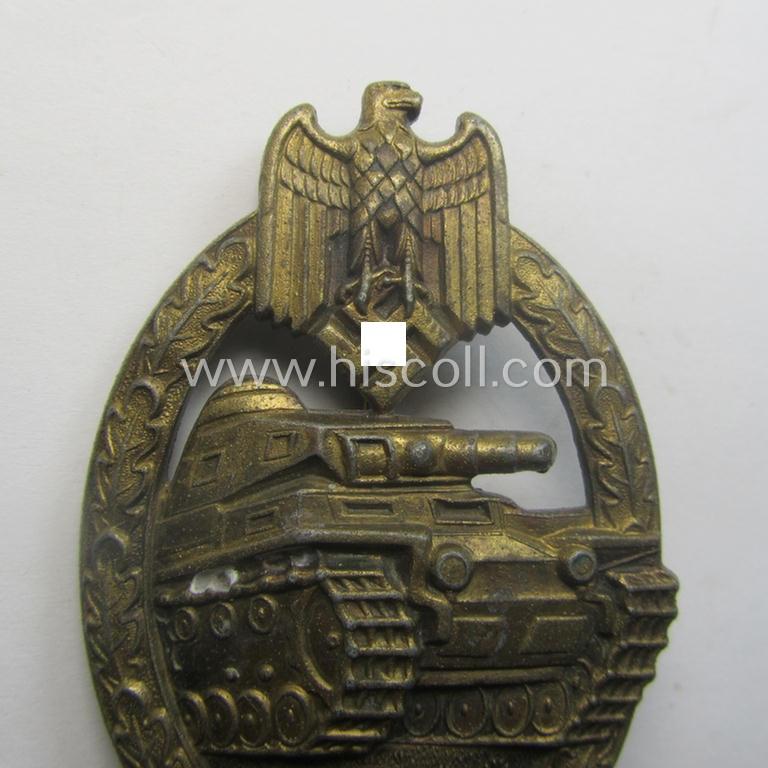 'Panzerkampfabz. in Bronze' (or: bronze-class panzer assault-badge or PAB) being a zinc- (ie. 'Feinzink'-) version (having a so-called: 'horizontal'-catch-set-up) as was procuced by the: 'Steinhauer u. Lück' (ie. 'S.& L.') company