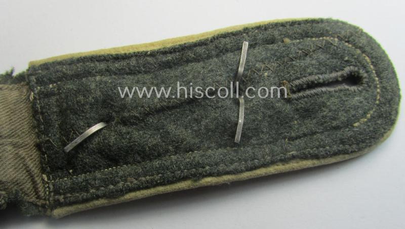 Single, WH (Heeres) NCO-type (ie. 'M40'- ie. 'M43'-pattern) shoulderstrap having the white-coloured branchcolour as was intended for - and clearly worn by! - an: 'Oberfeldwebel der Infanterie-Trpn.'