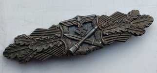 A  Nahkampfspange (Close Combat Clasp) in Bronze Grade,...