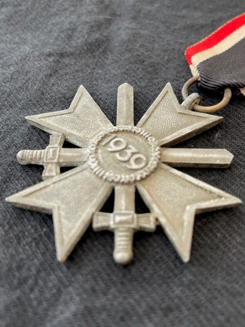 GERMAN WWII WAR MERIT CROSS 2nd CLASS WITH SWORDS NUMBERED RING 45 PRODUCED BY JULIUS BAUER SOHNE.