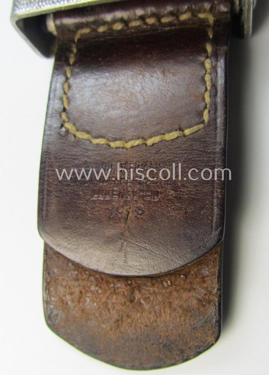 Superb, WH (Heeres) 'standard-pattern', field-grey-toned- and aluminium-based belt-buckle being a maker- (ie. 'Bernh. Haarmann'-) marked- and/or '1939'-dated example that comes mounted onto its (unit-stamped!) leather-based tab